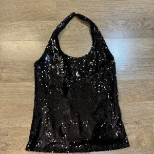 Top americana paillettes  kontatto